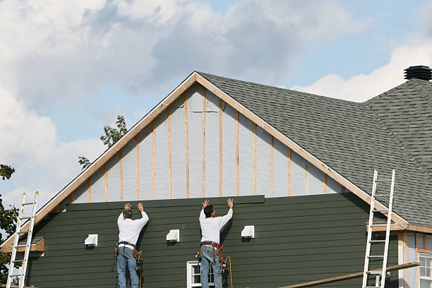 Professional Siding technician working in Garden City, GA